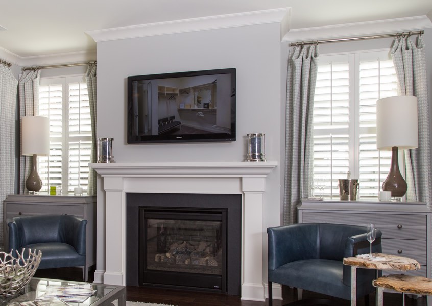 tv room Denver faux wood shutters